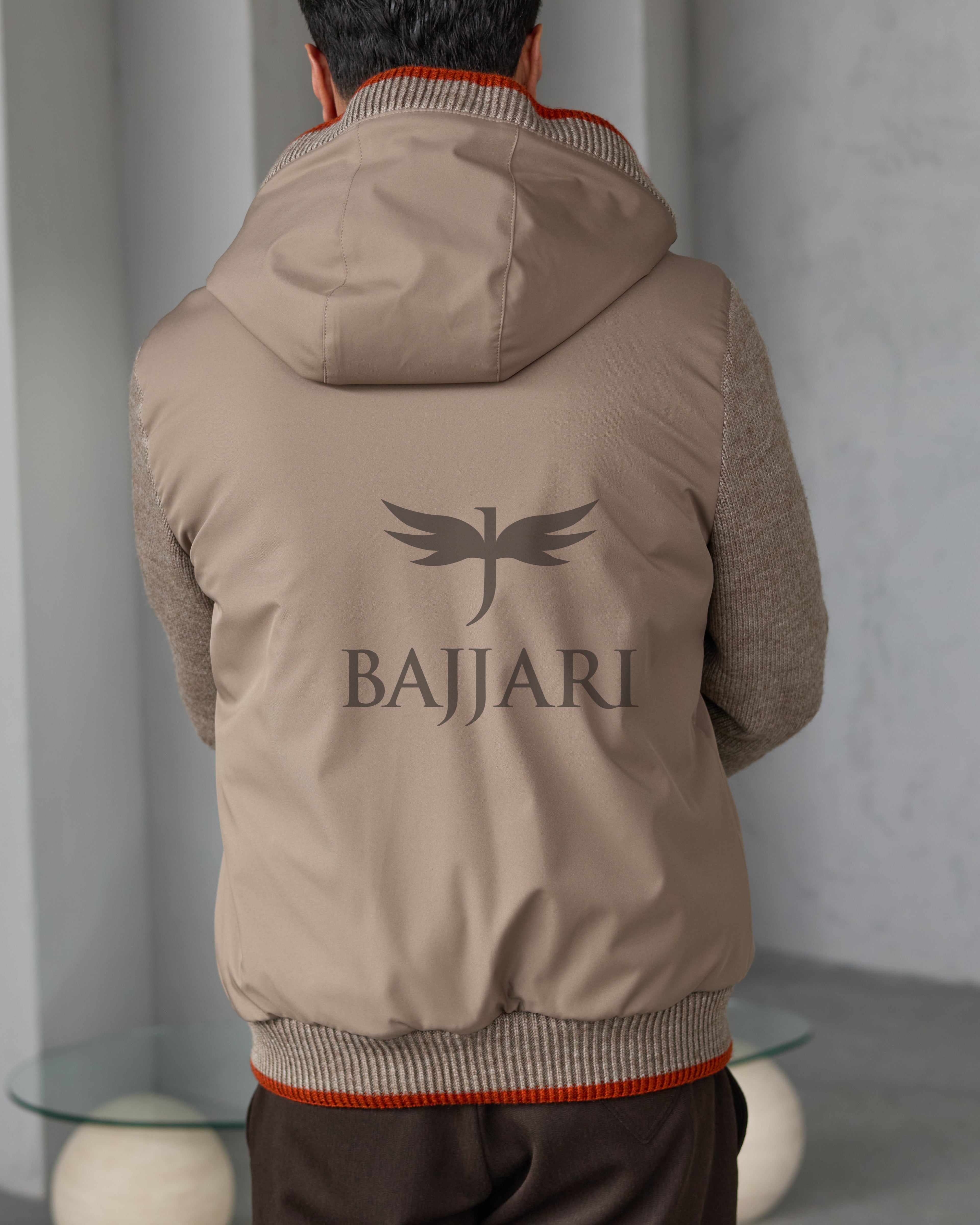 Men's hooded jacket with fur lining, knitted fabric sleeves, and waterproof fabric