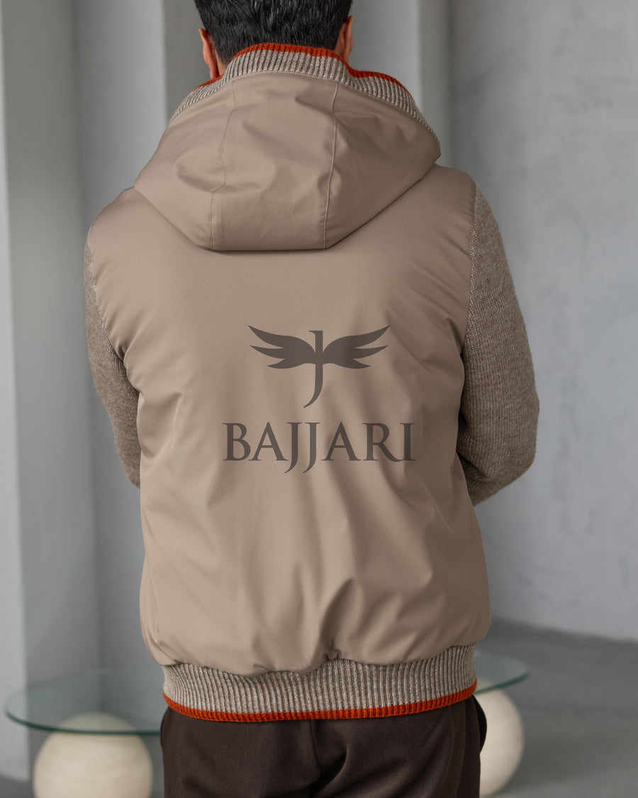 Men's hooded jacket with fur lining, knitted fabric sleeves, and waterproof fabric