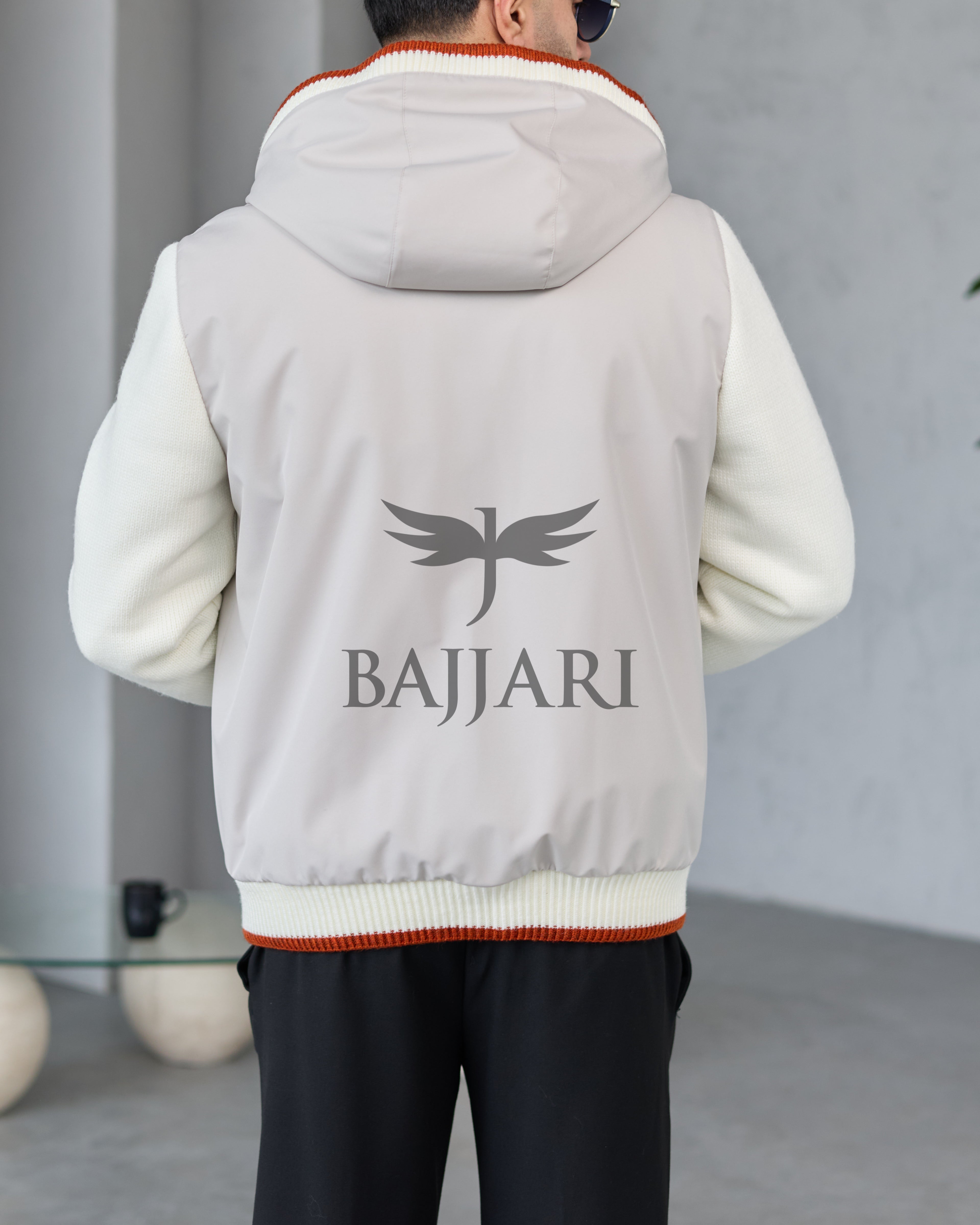 Men's hooded jacket with fur lining, knitted fabric sleeves, and waterproof fabric